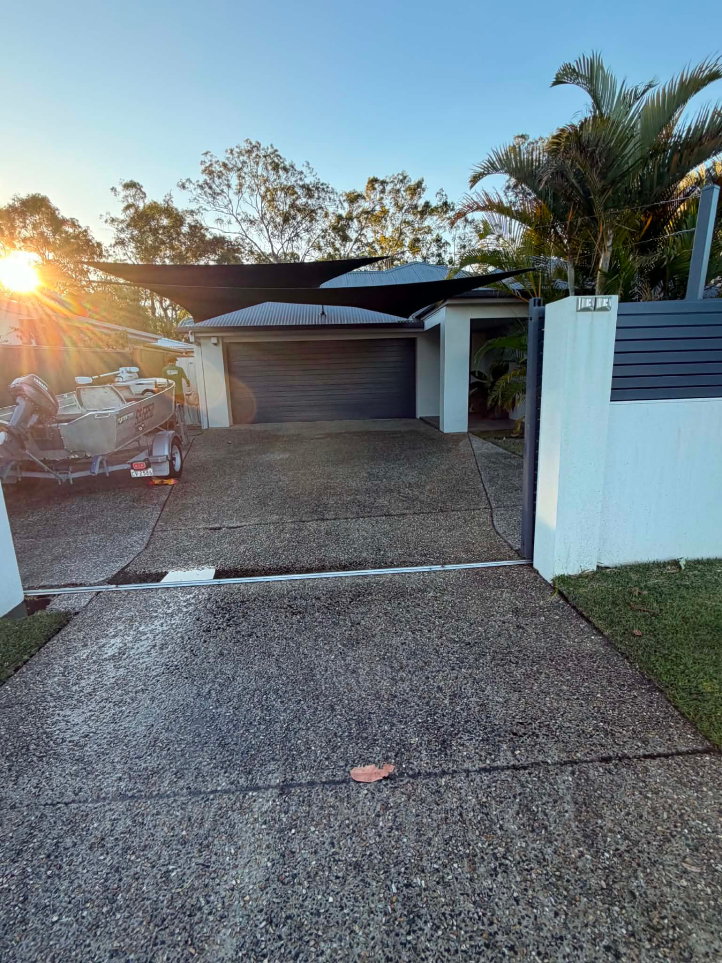Driveway with dirt and mould before pressure washing